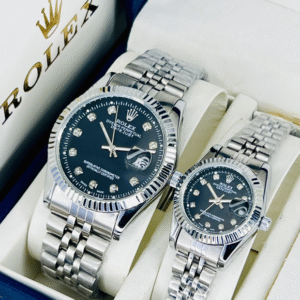 Luxury silver couple Rolex watch set with diamond dial, stainless steel bracelet, elegant unisex design, available now at Zainab Closets